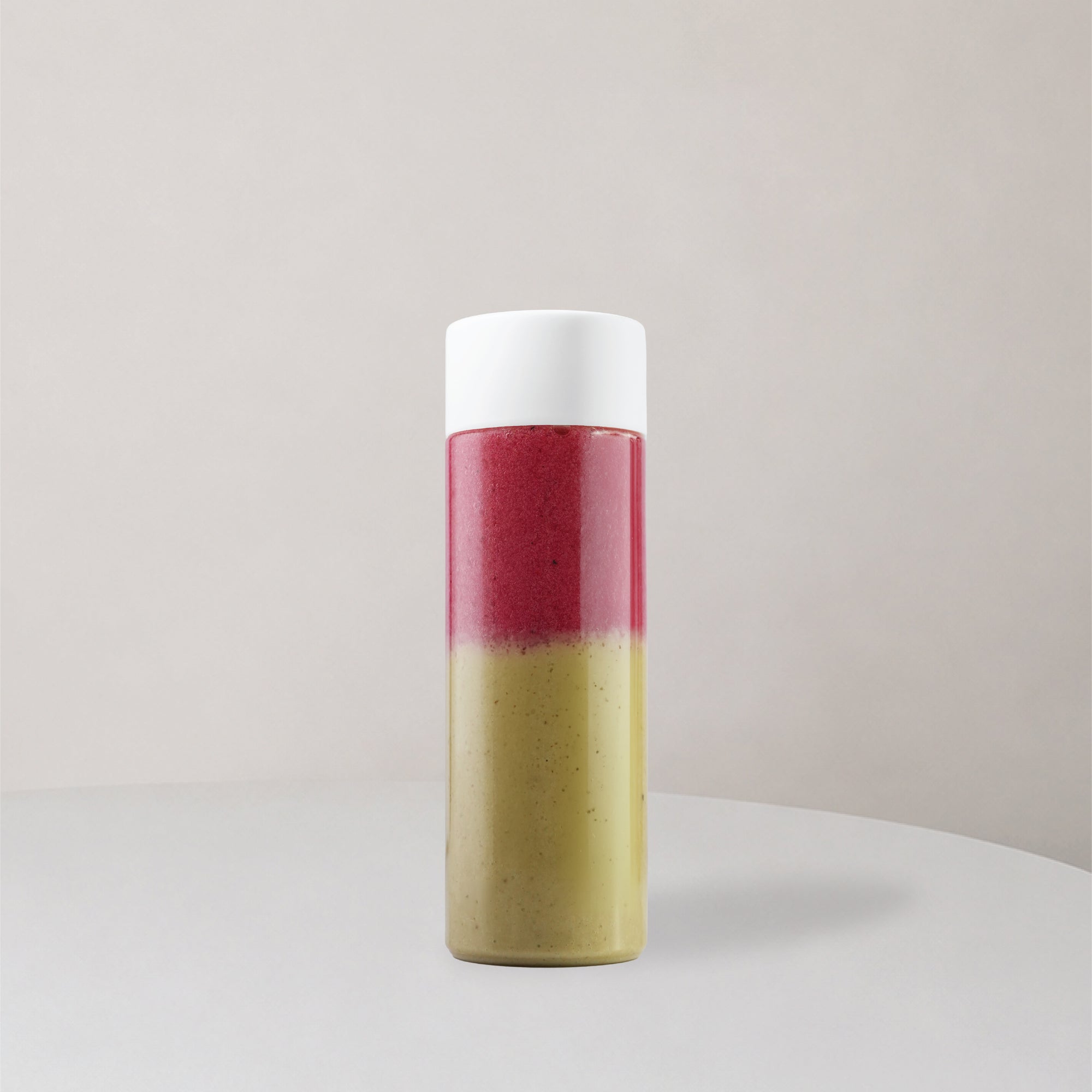 Medium bottle with two layer juice