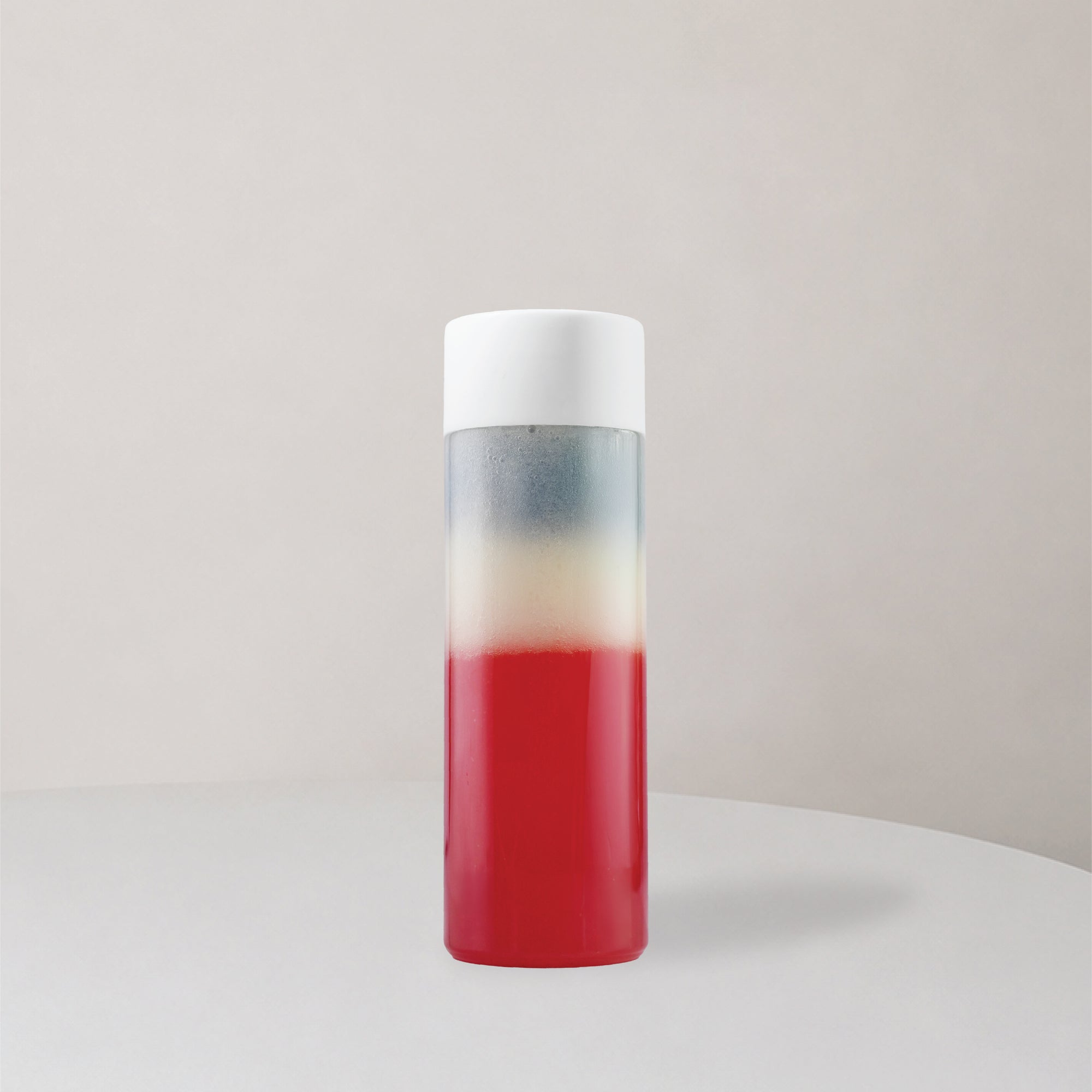 Medium bottle with three layer juice