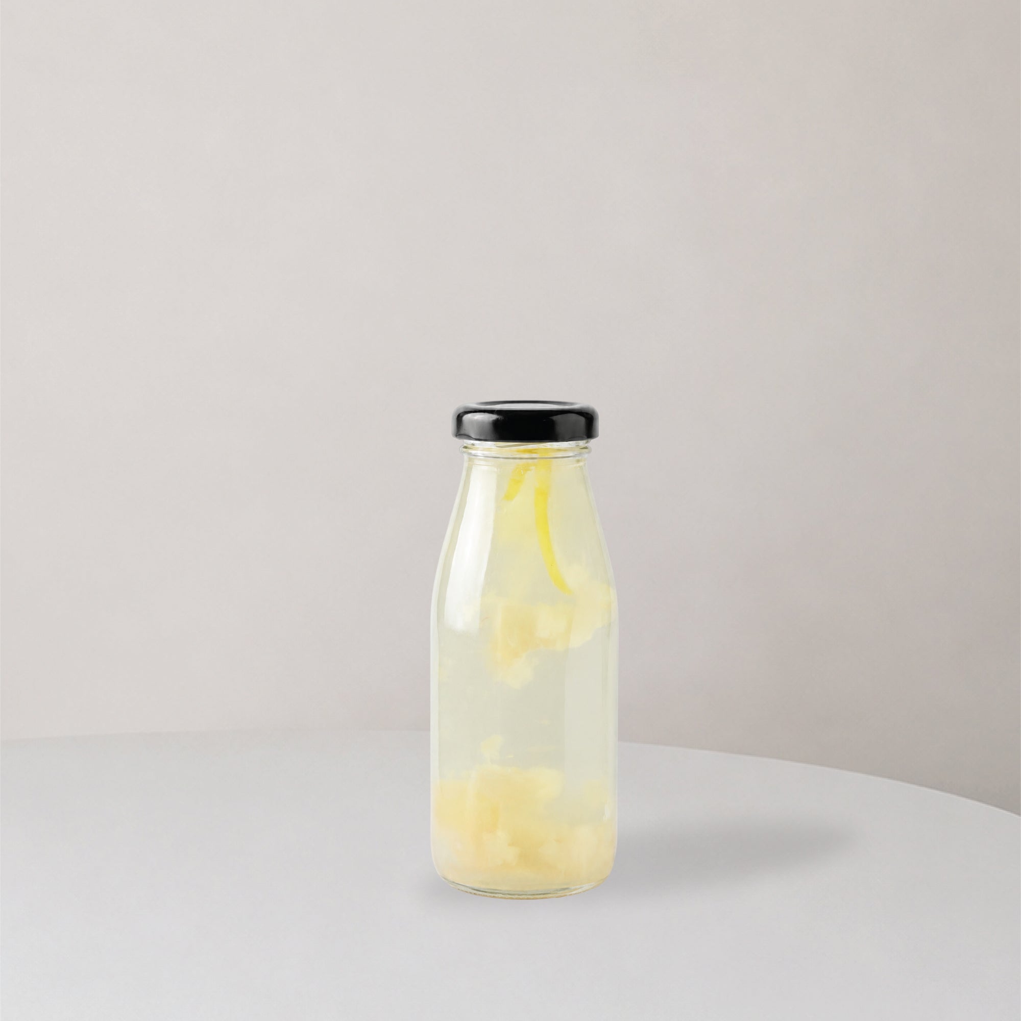 Glass bottle with single layer juice