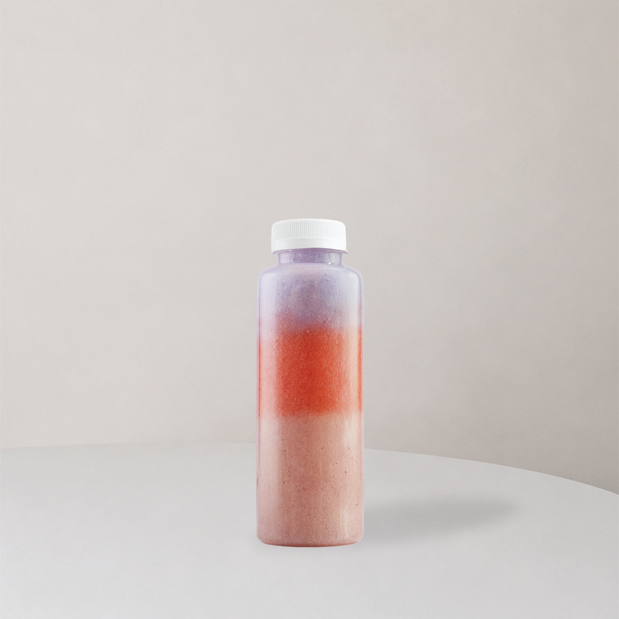 Small bottle with three layer juice