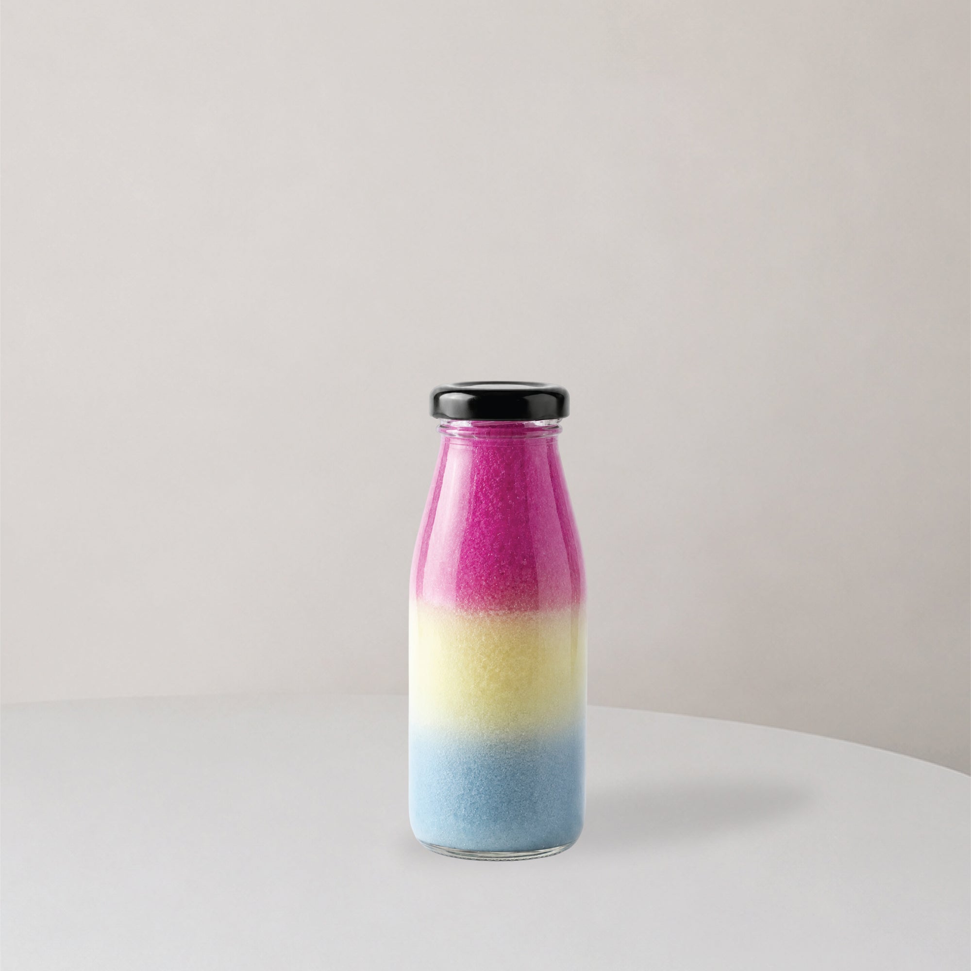 Glass bottle with three layer juice