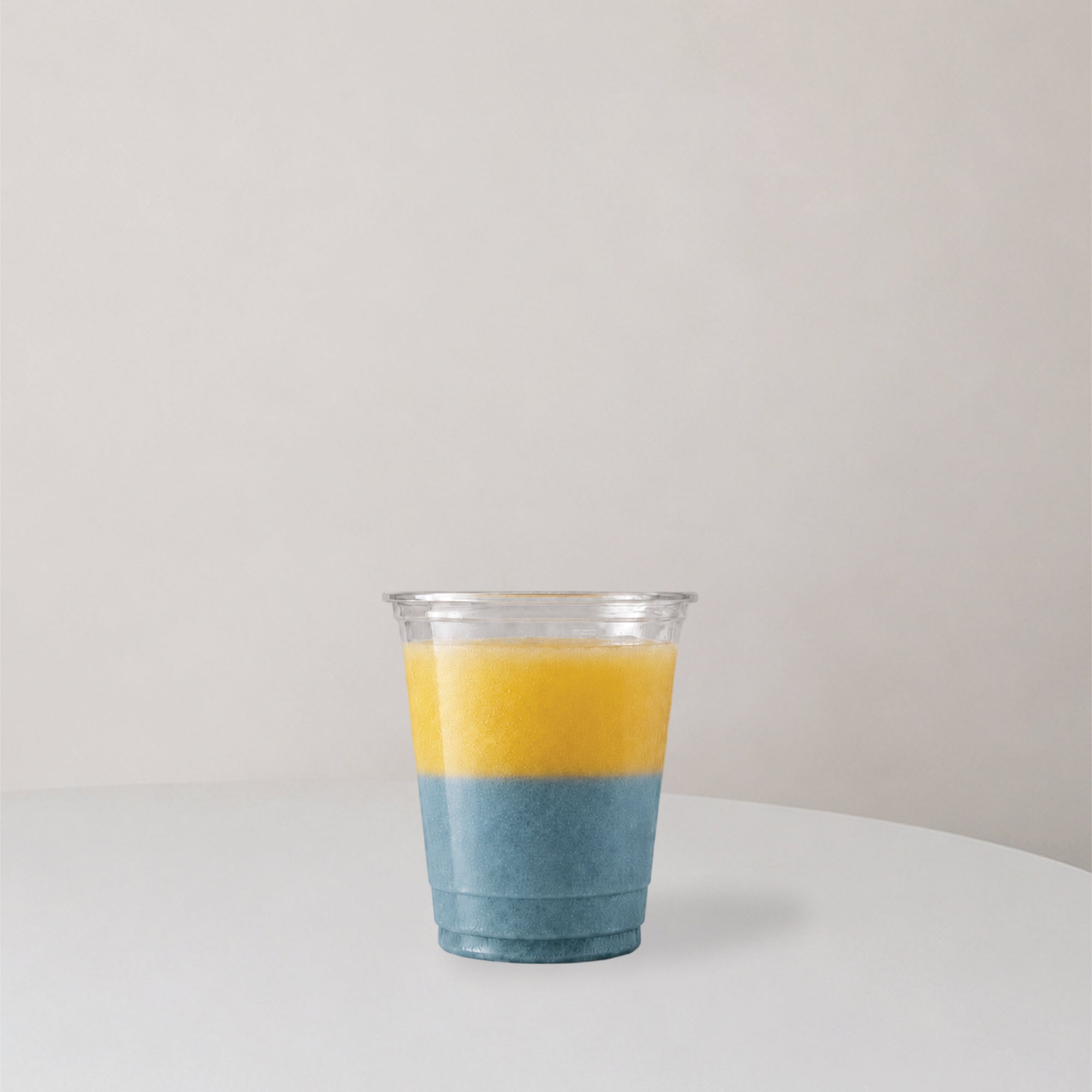 Cup bottle with two layer juice